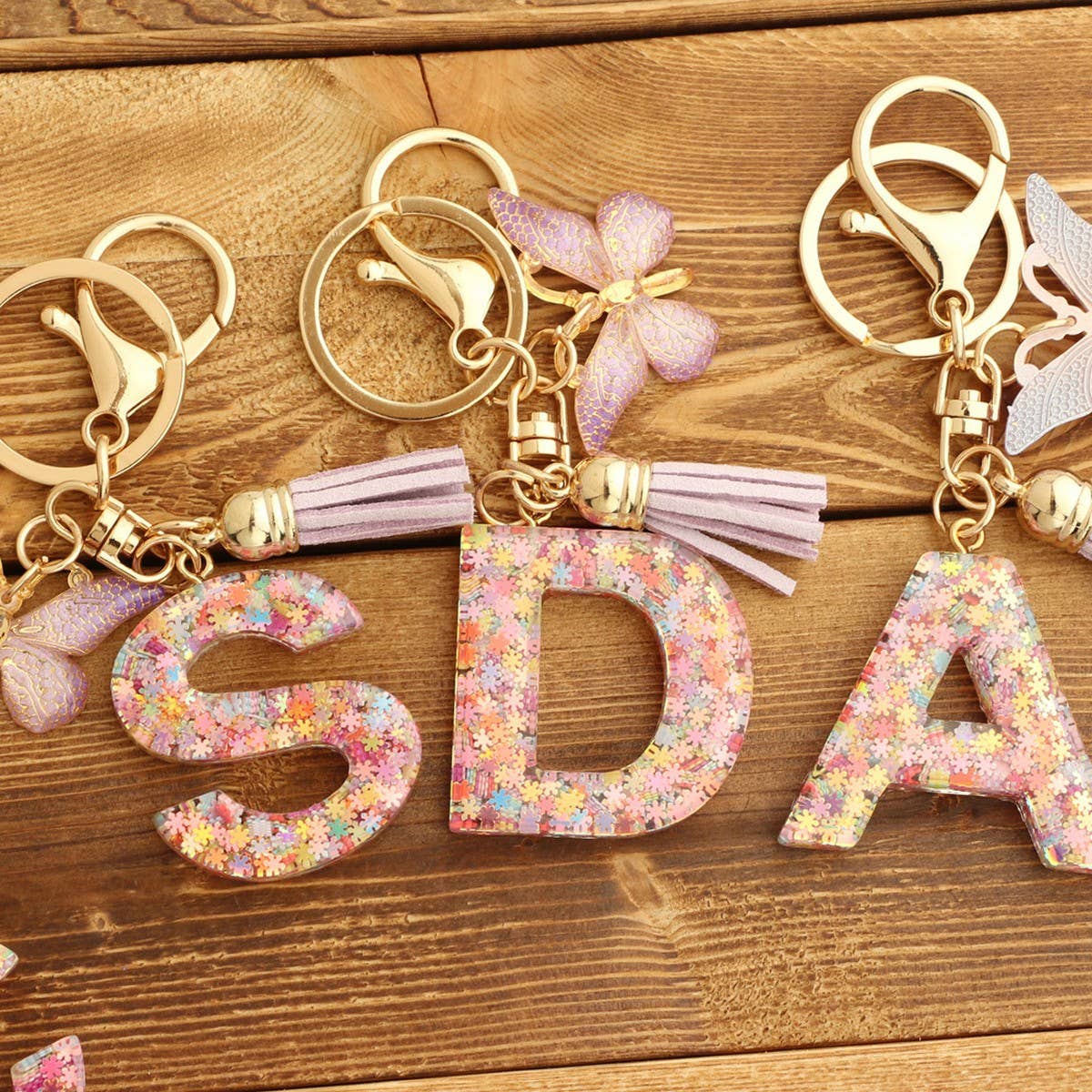 Pink Snowflake Letter Butterfly Keychain_CWMM6865