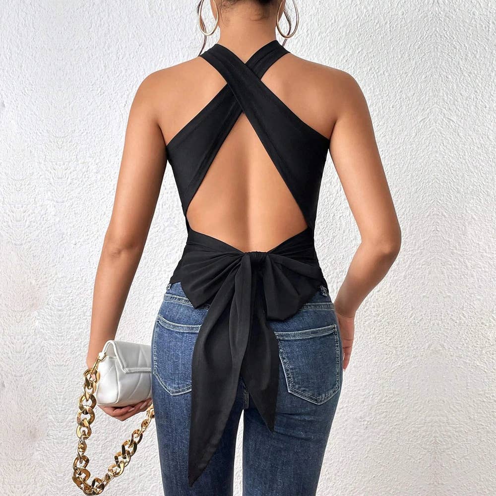 A backless, lace-up, sleeveless halter top