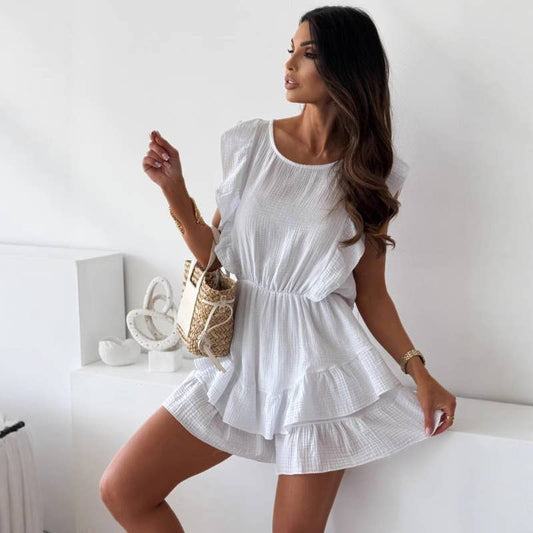 Solid-color waist-cinched ruffled jumpsuit