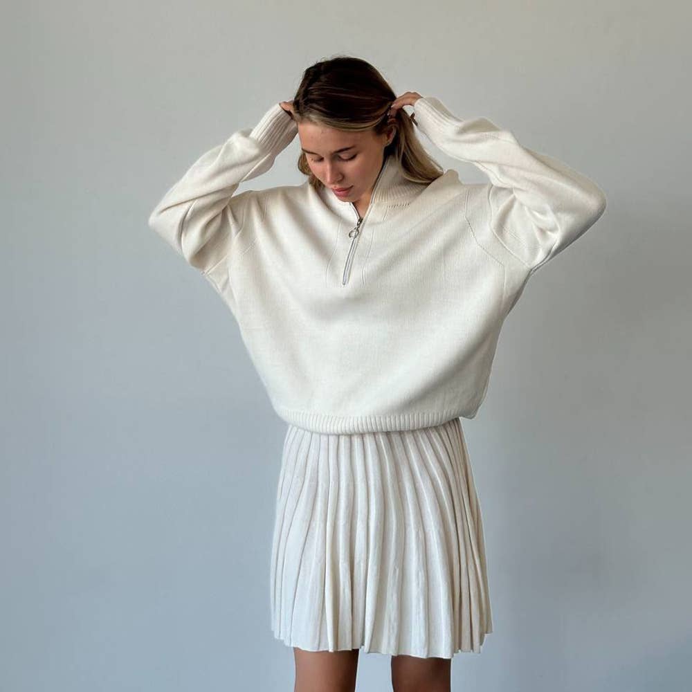 Two-piece knitted sweater and short skirt set
