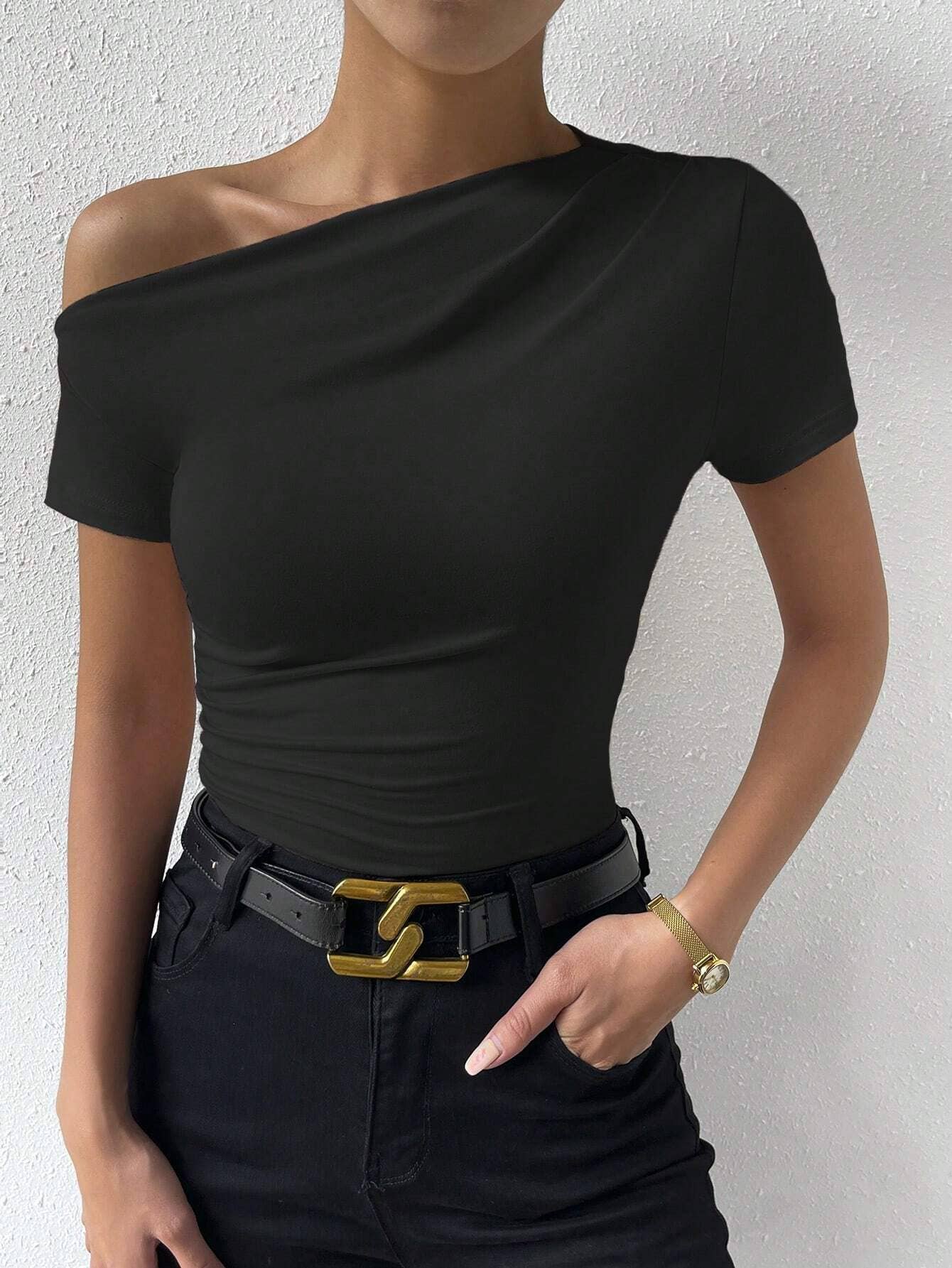 Short-sleeved top with sloping neck design