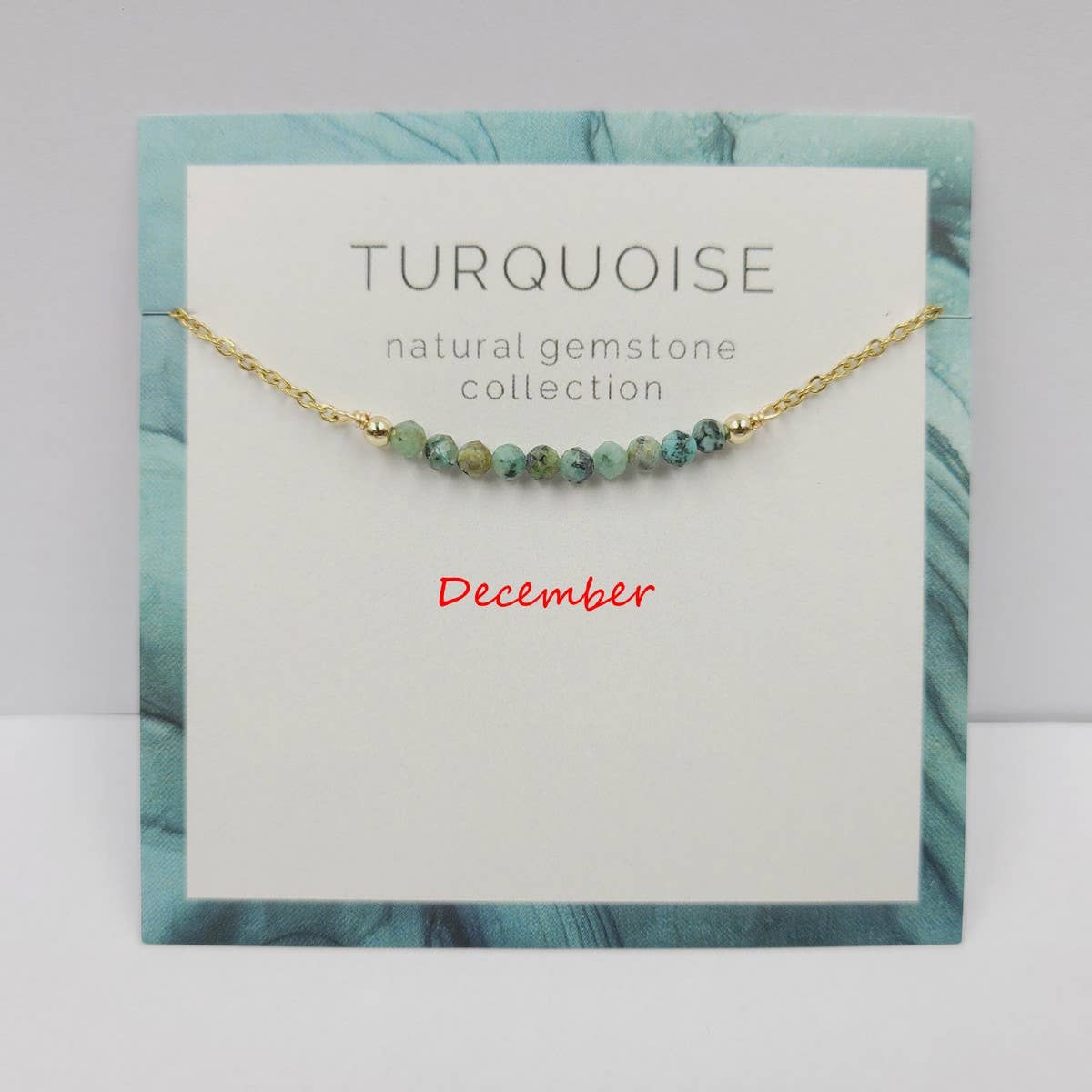 DECEMBER NECKLACE NATURAL STONE LOCK BONE CHAIN