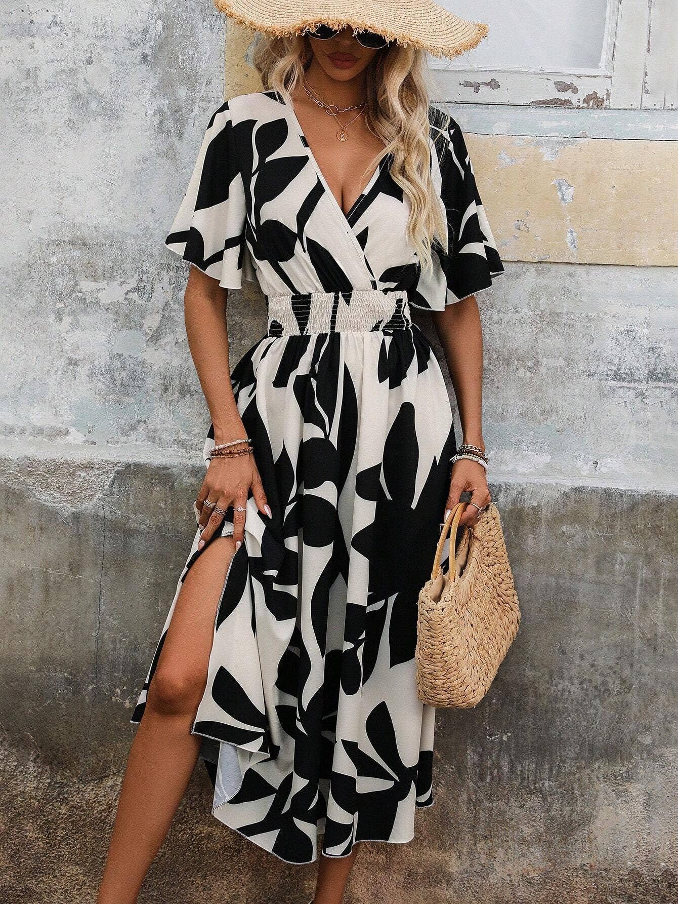 A cross-neck belt floral printed slit dress