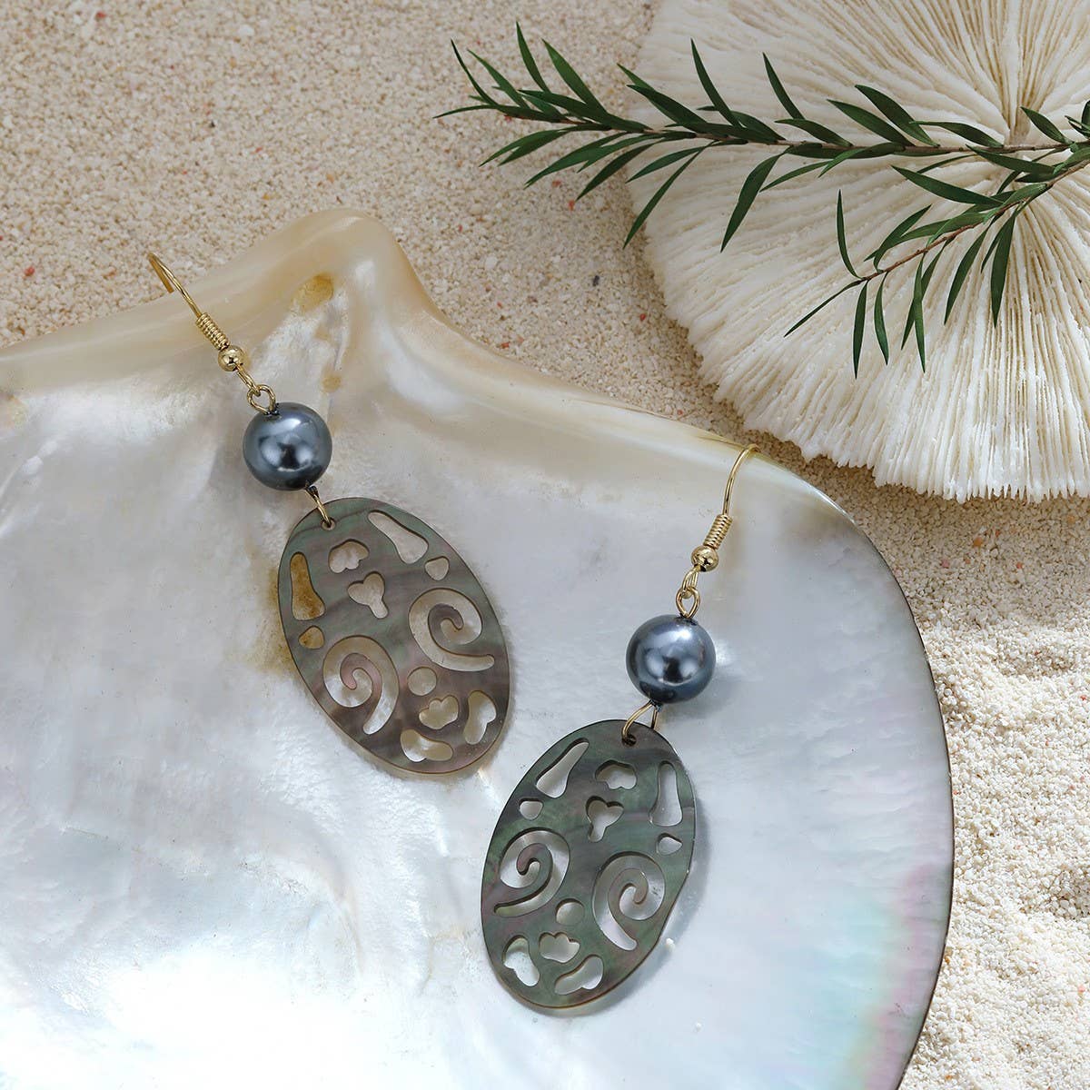 CREATIVE HOLLOW CARVED NATURAL SHELL EARRINGS