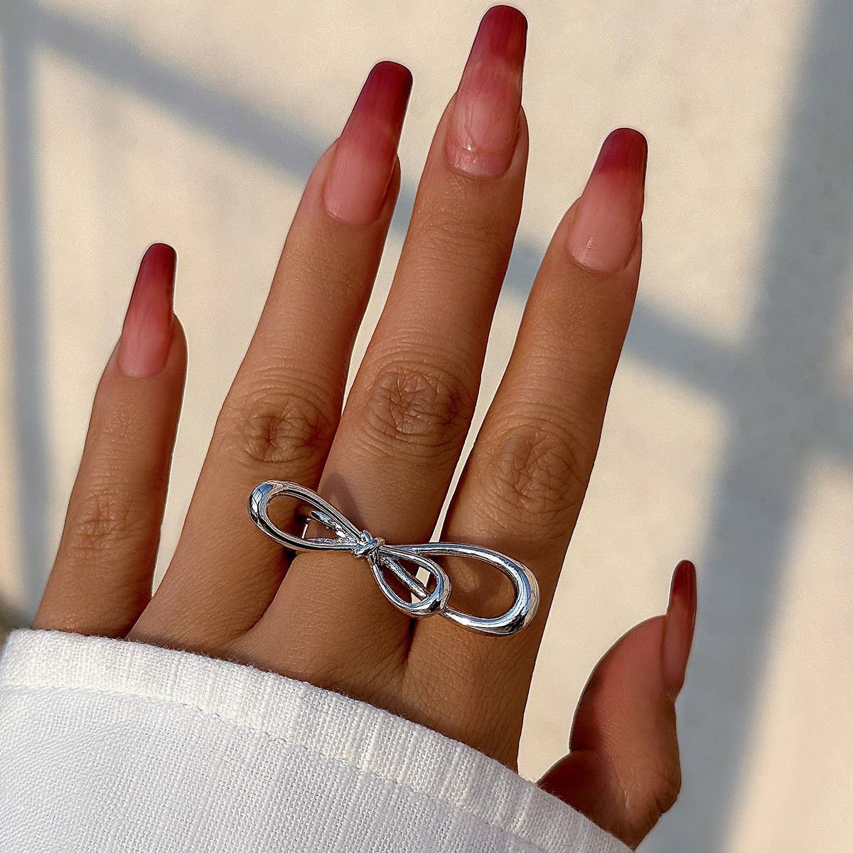 SIMPLE ASYMMETRICAL STATEMENT FRENCH RING