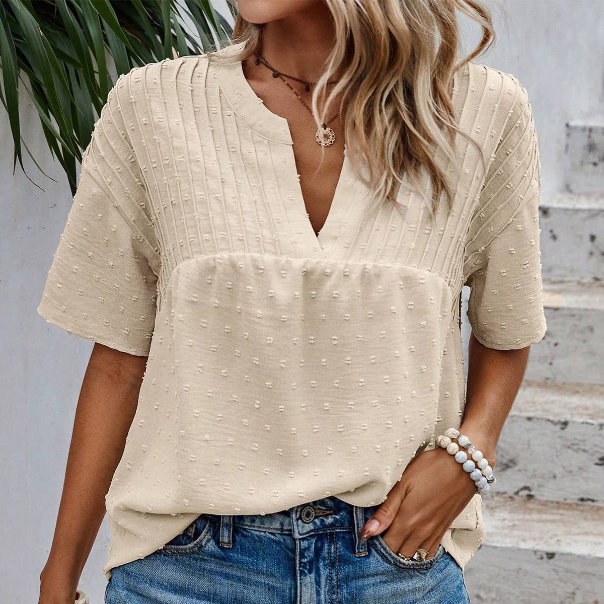 SWISS POLKA DOT PLEATED TOP WITH A CUT NECK