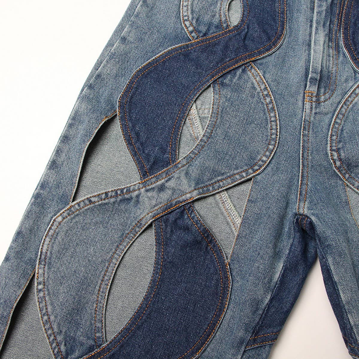 SPLICED CONTRASTING HOLLOW OUT JEANS_CWJP0189