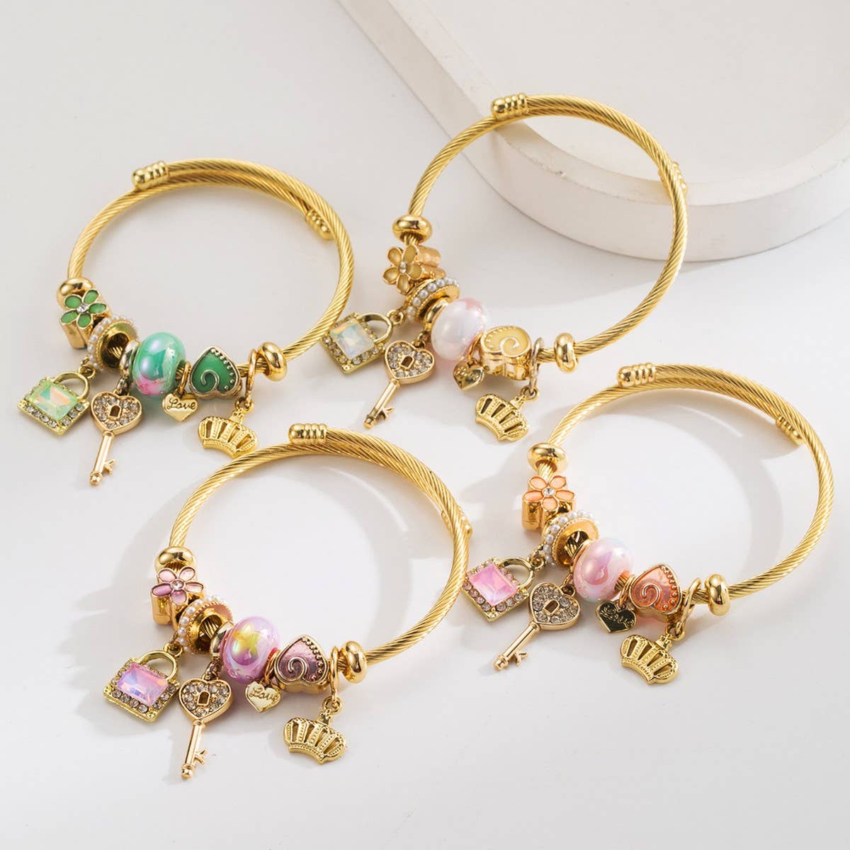 Adjustable Gold Bracelet with Crown, Key & Heart_CWMM8565