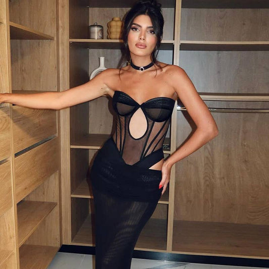 A corset, sheer, short, tight, cinched jumpsuit