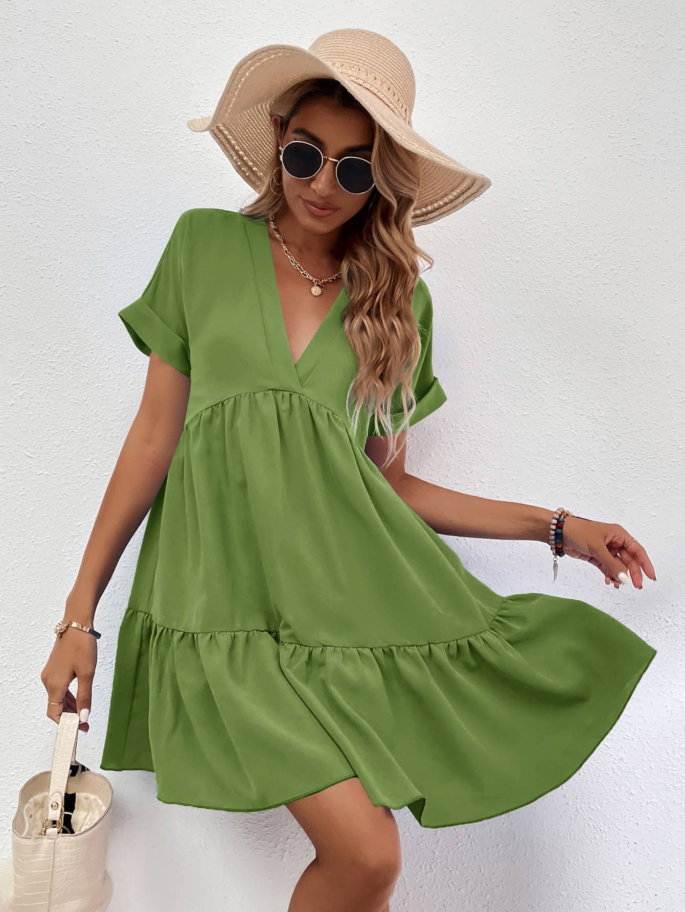 A casual, loose V-neck, large-hem short dress