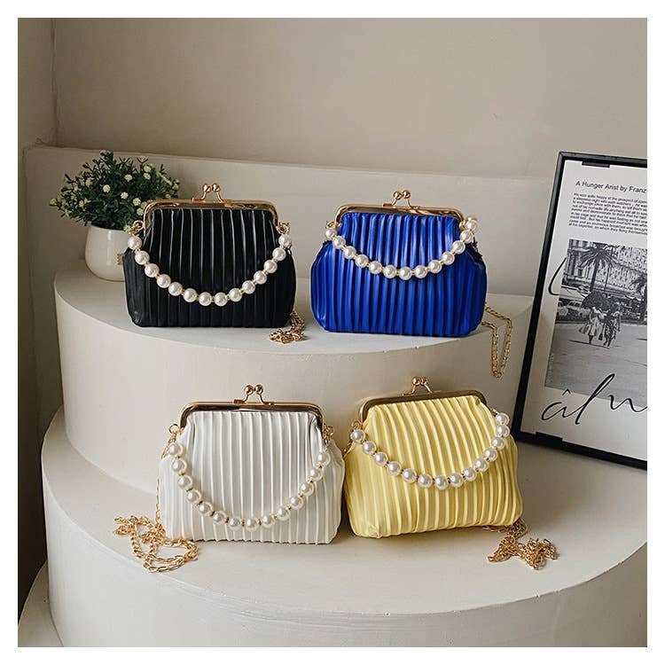 Pearl shell bag diagonally across the body