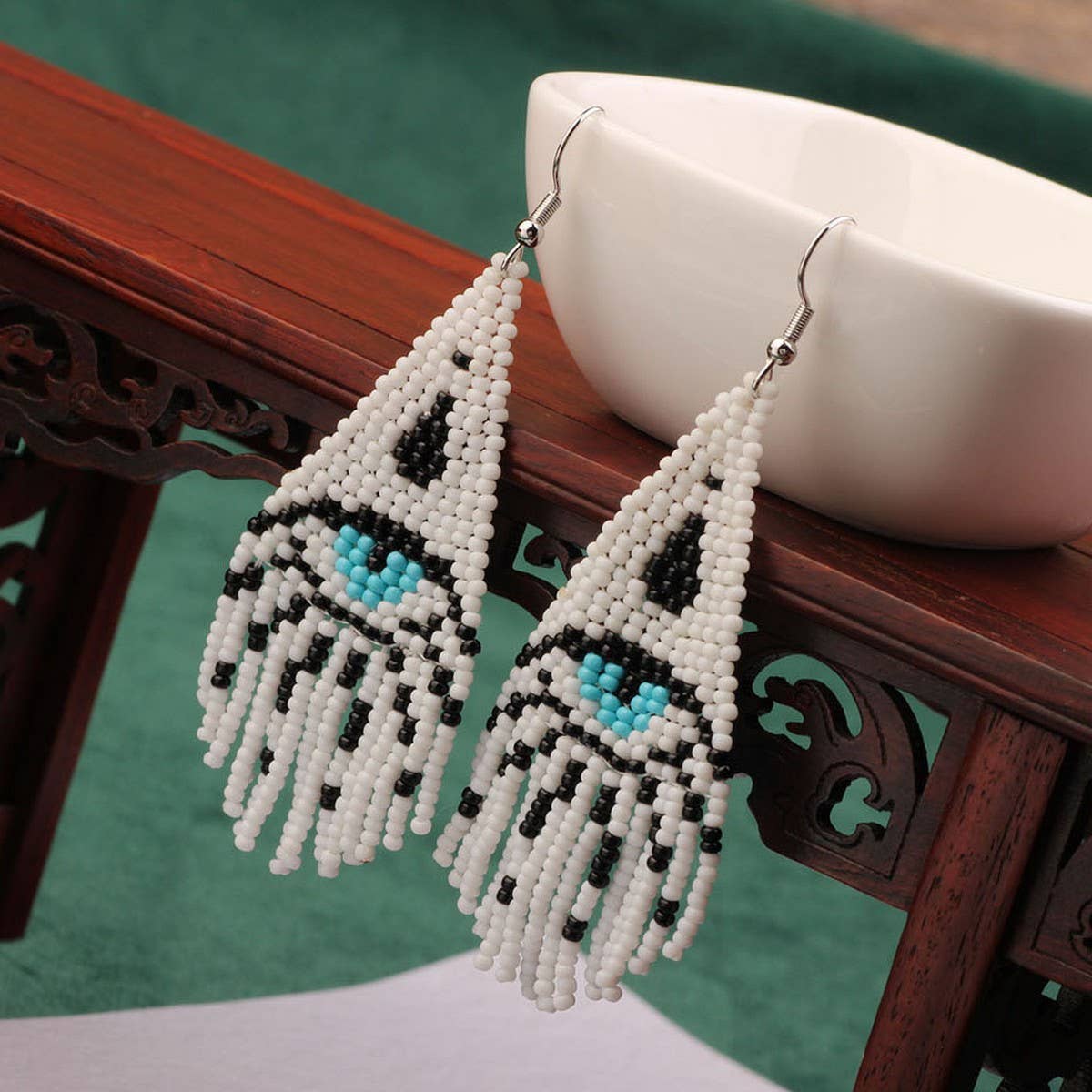 WESTERN DEVIL'S EYE BRAIDED TASSEL EARRINGS