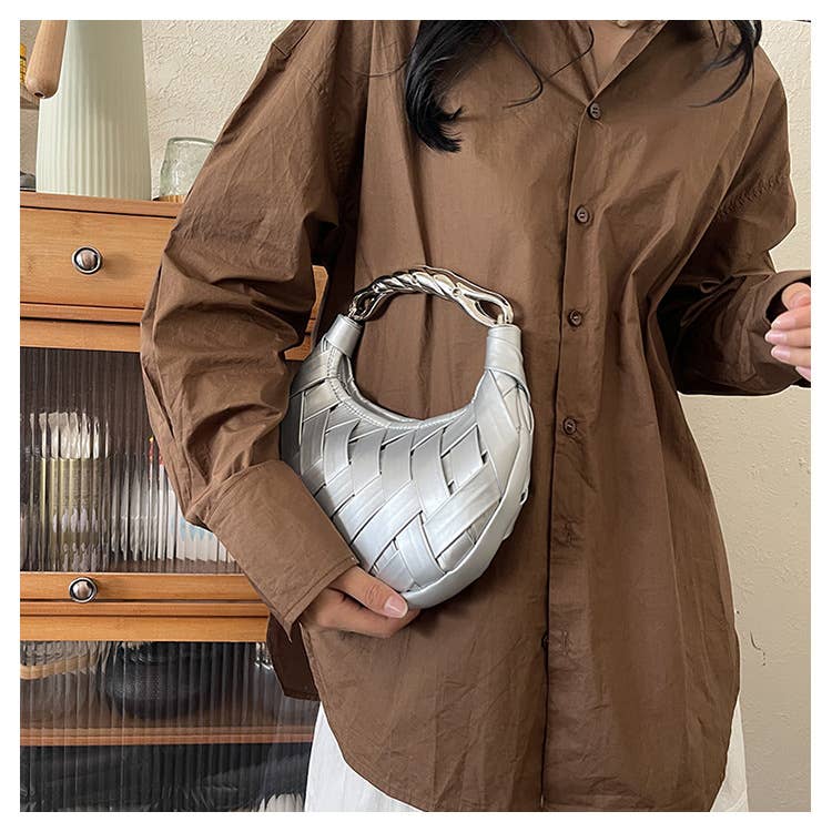 Fashionable niche woven hand-held crossbody bag