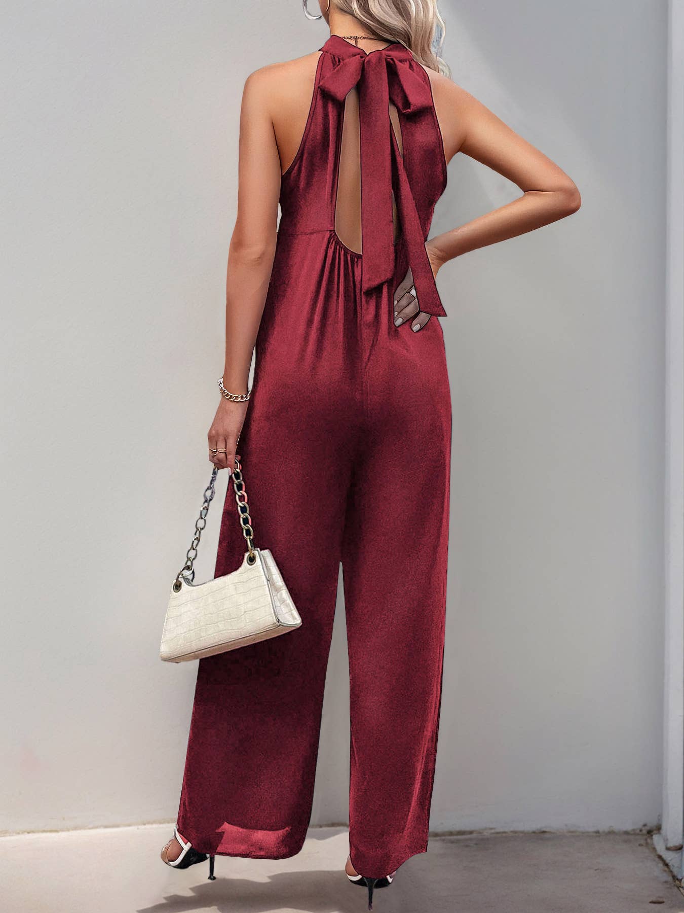 Solid color wide-leg romper with casual high neck