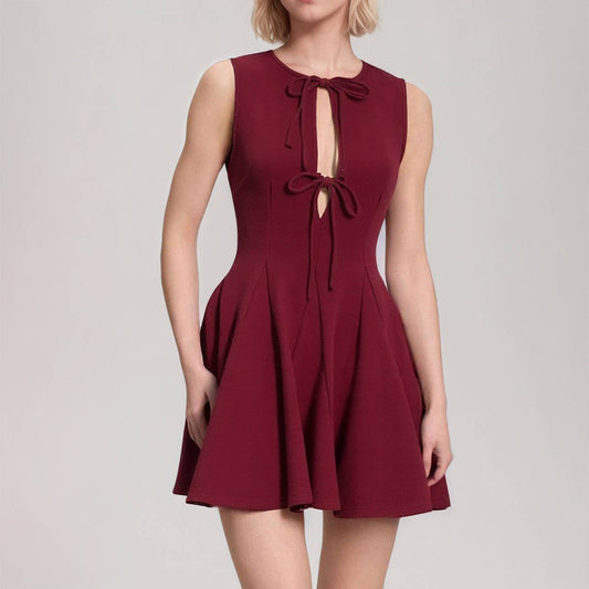 Fitted waist and bow tie sleeveless dress