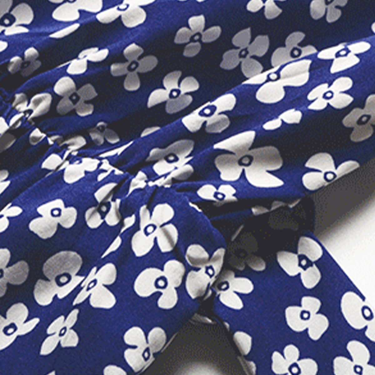 V-NECK LACE-UP PEPLUM HOLIDAY DRESS