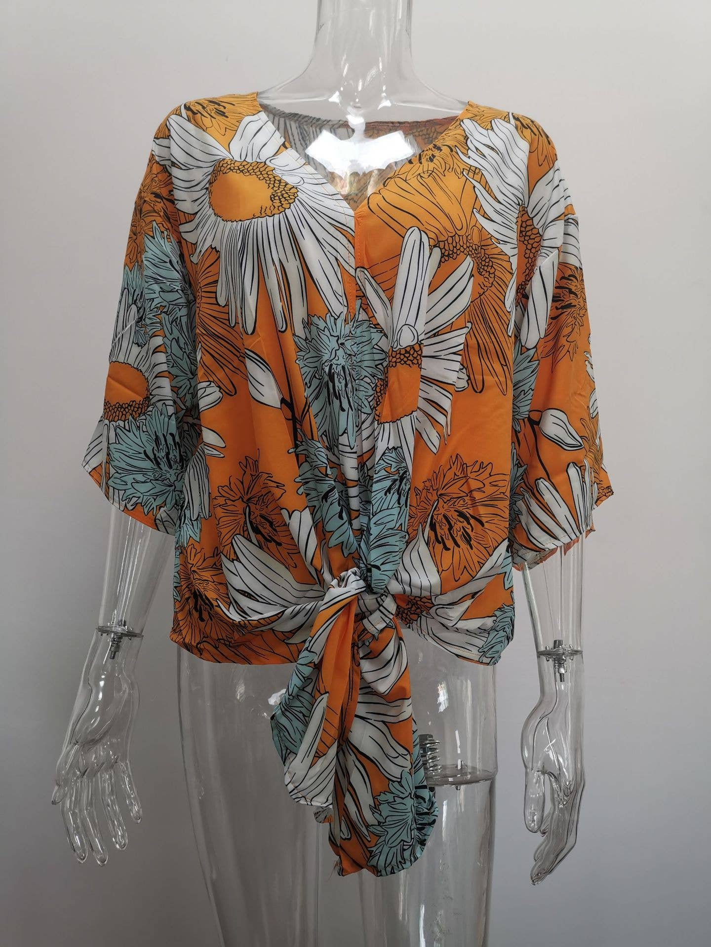 V-neck knotted printed loose sleeved top