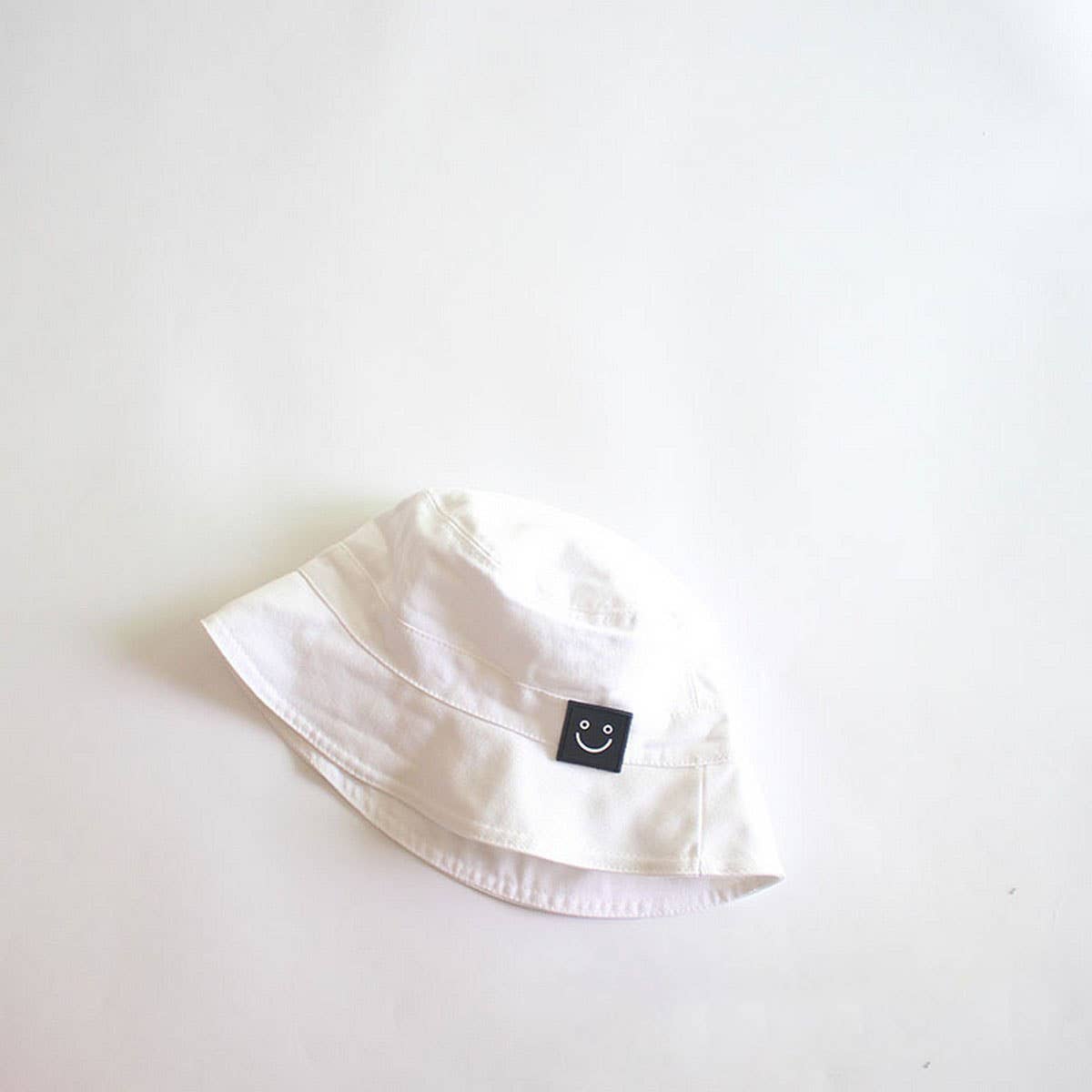 SOLID COLOR SMILEY FACE CHILDREN'S BUCKET HAT_CWAH2872