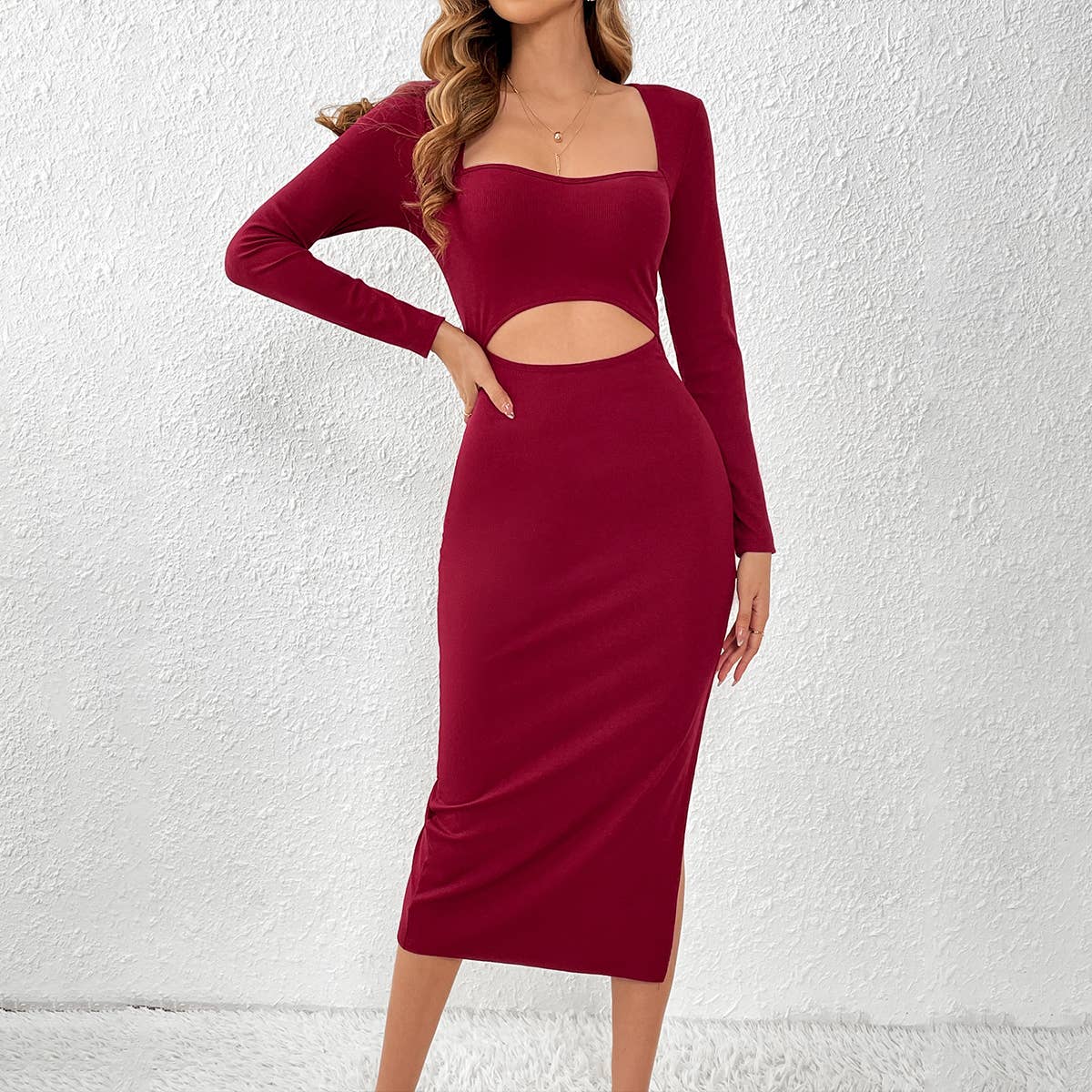 HOLLOWED OUT AT THE WAIST AND SPLIT AT THE SIDE