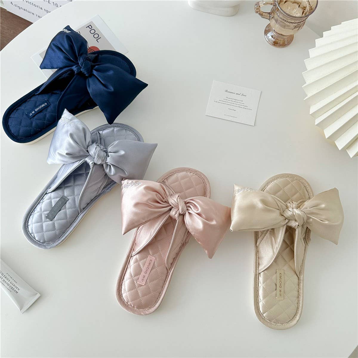 LETTER EMBROIDERED HOLLOW BOW HOME SLIPPERS