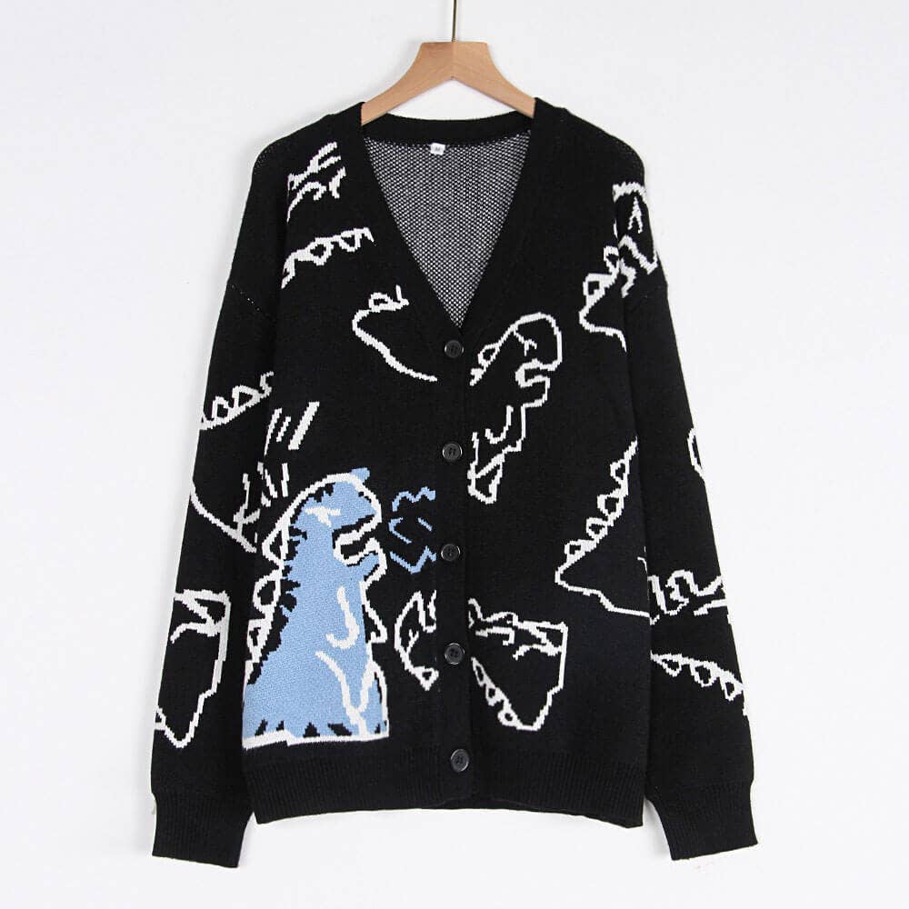 THE JACKET IS A LOOSE CARTOON DINOSAUR CARDIGAN