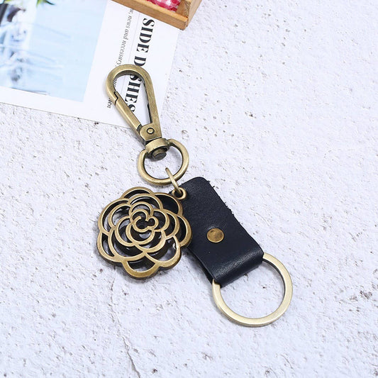 CREATIVE BRONZE ROUND FLOWER COWHIDE KEYCHAIN