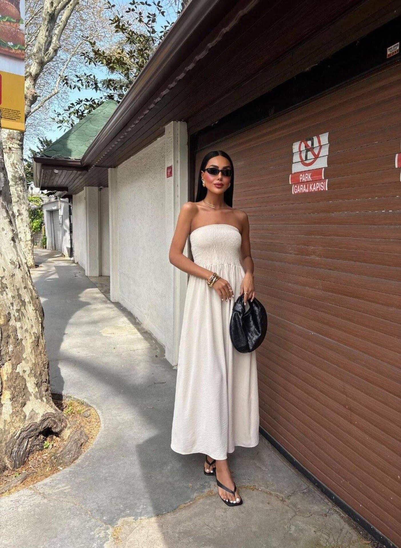 Solid-color strapless waist-cinching long dress