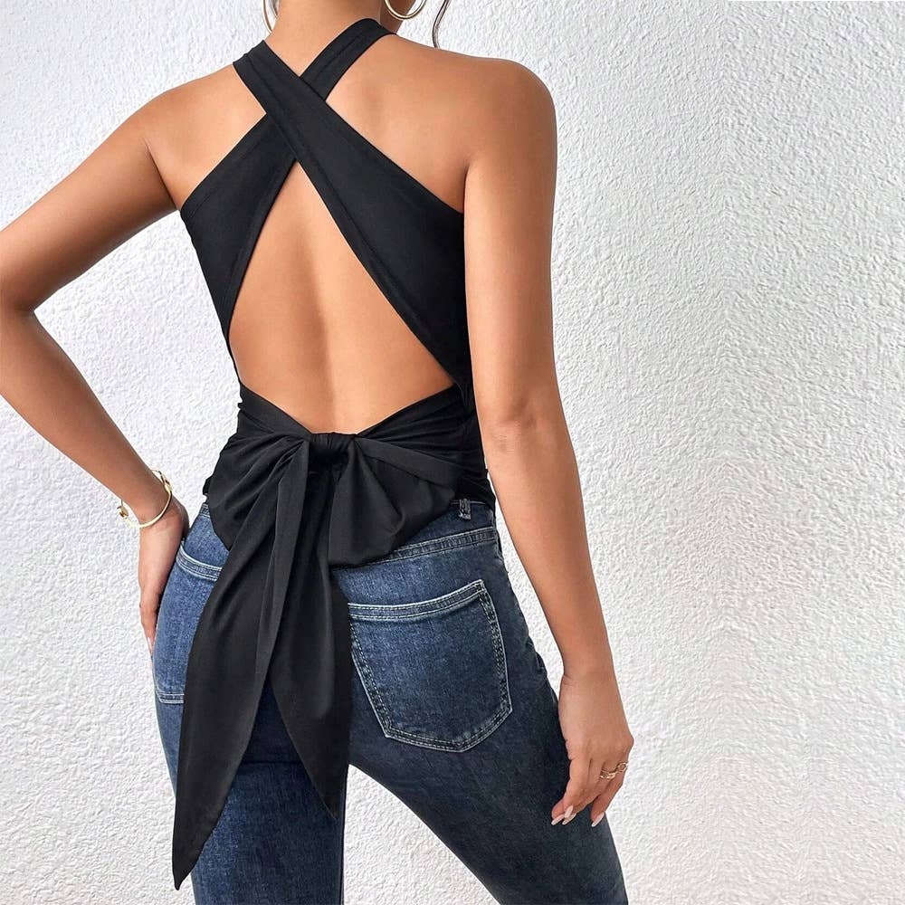 A backless, lace-up, sleeveless halter top