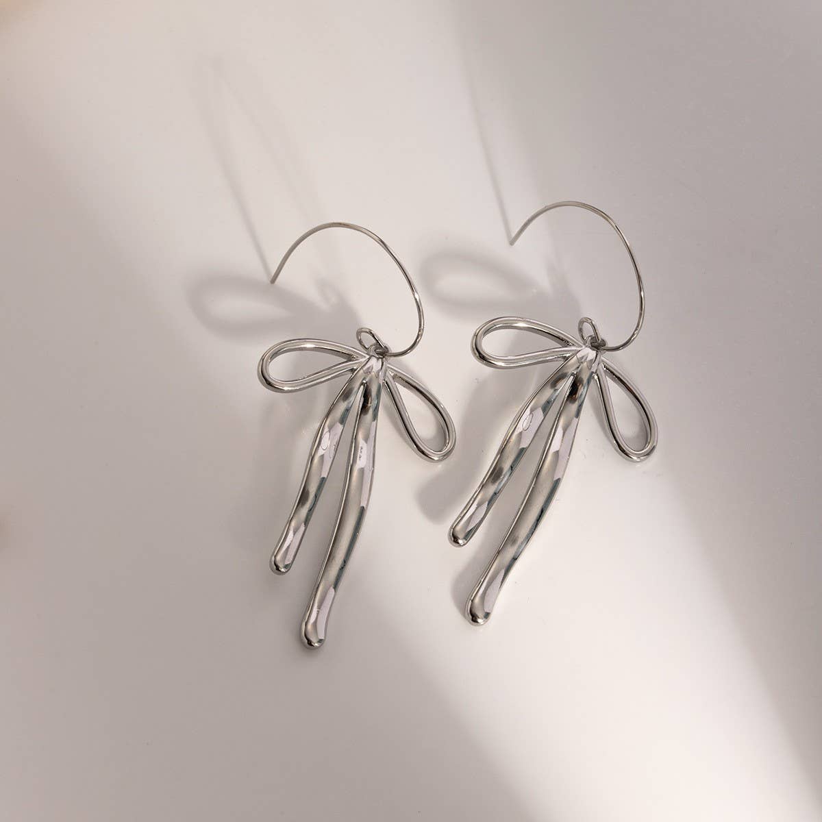 PERSONALITY FASHION 1 STEEL BOW PENDANT EARRINGS_CWAJE1880