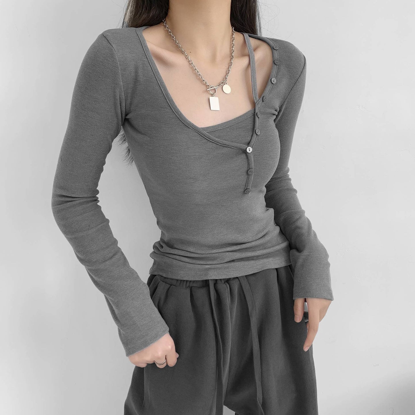 TWO BUTTON-UP LONG-SLEEVED T-SHIRTS