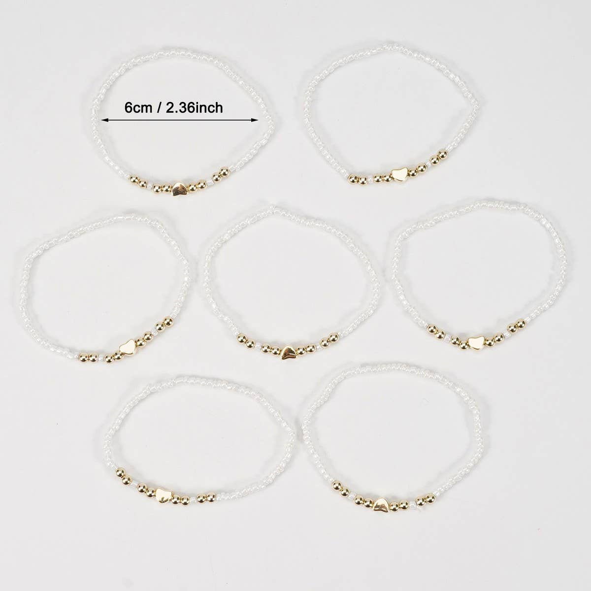 CWAJE05685_BOHO HEART MULTI LAYER ELASTIC BEADED BRACELET