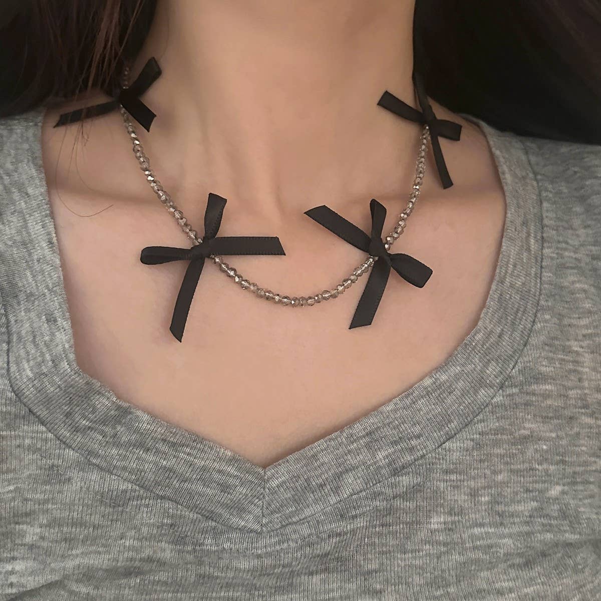 HAND-WOVEN BLACK CRYSTAL BEADED BOW NECKLACE