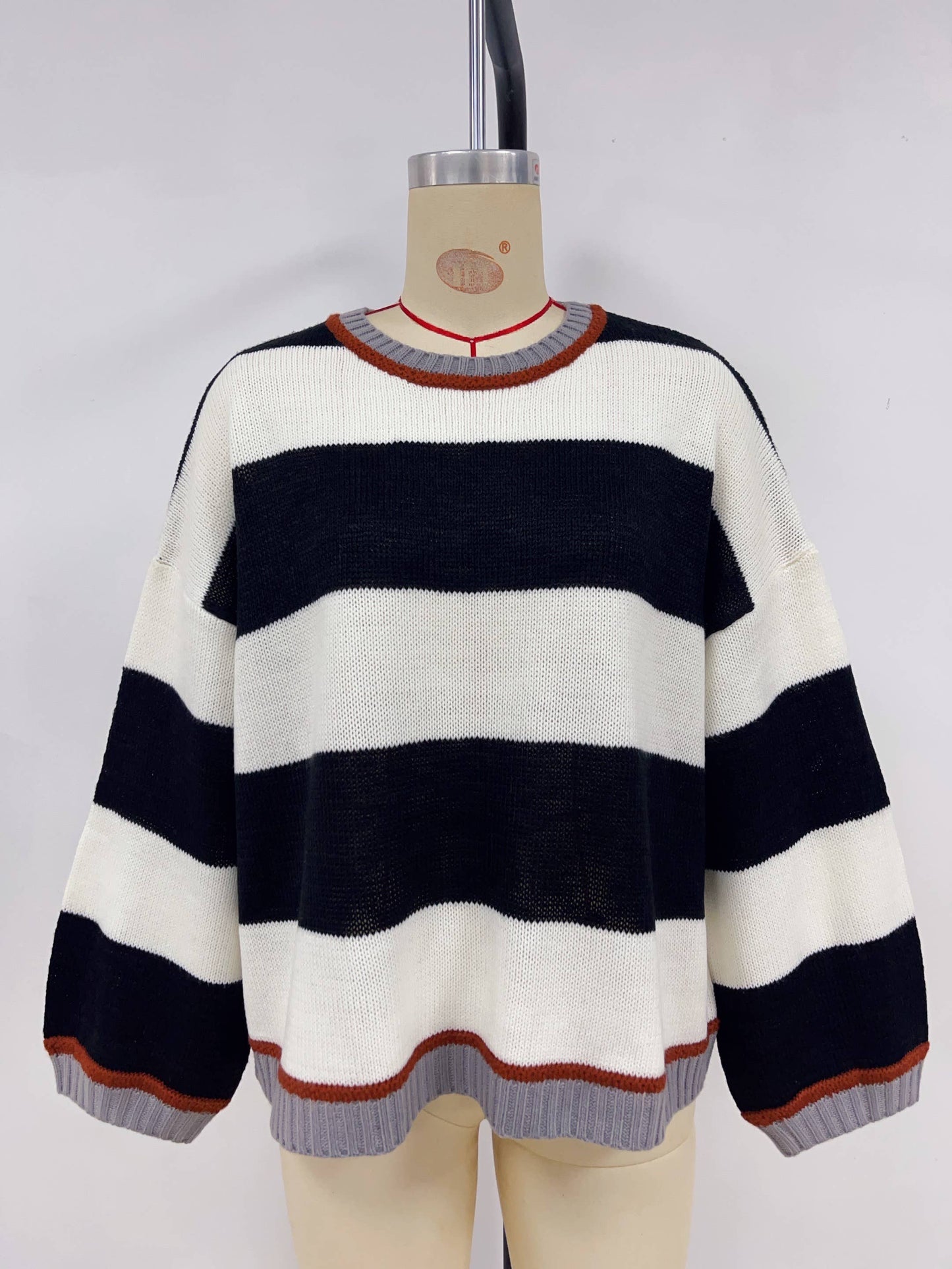 Knitted loose color-blocking striped sweater