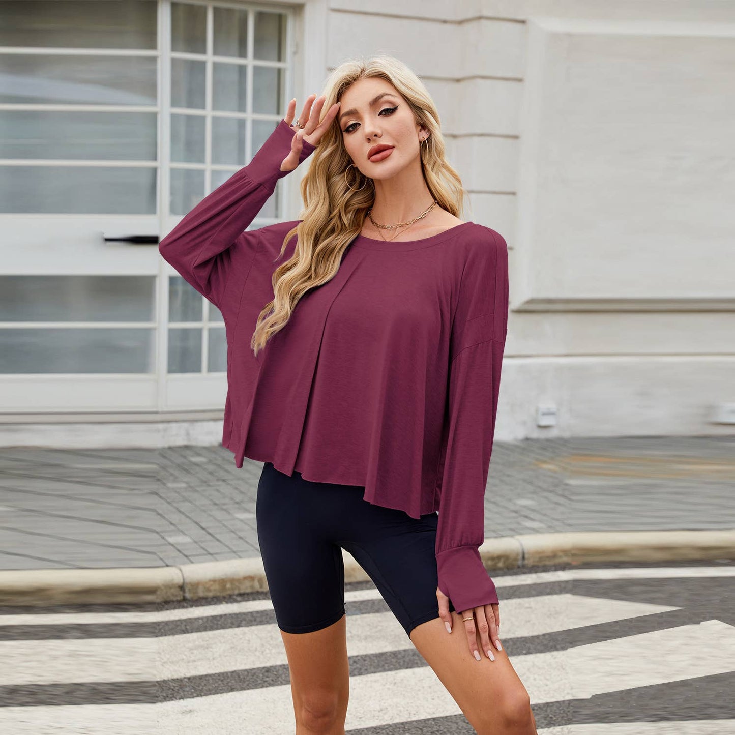 Long sleeve solid color loose back cut-out top