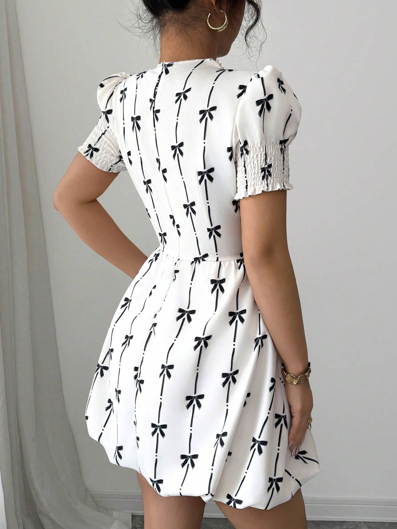 Waist-cinching bow printed flower bud dress