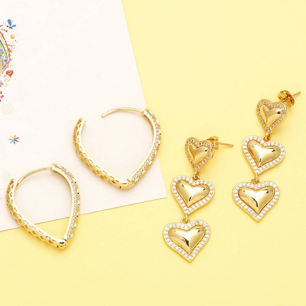 GOLD PLATED HEART SHAPED PENDANT EARRINGS