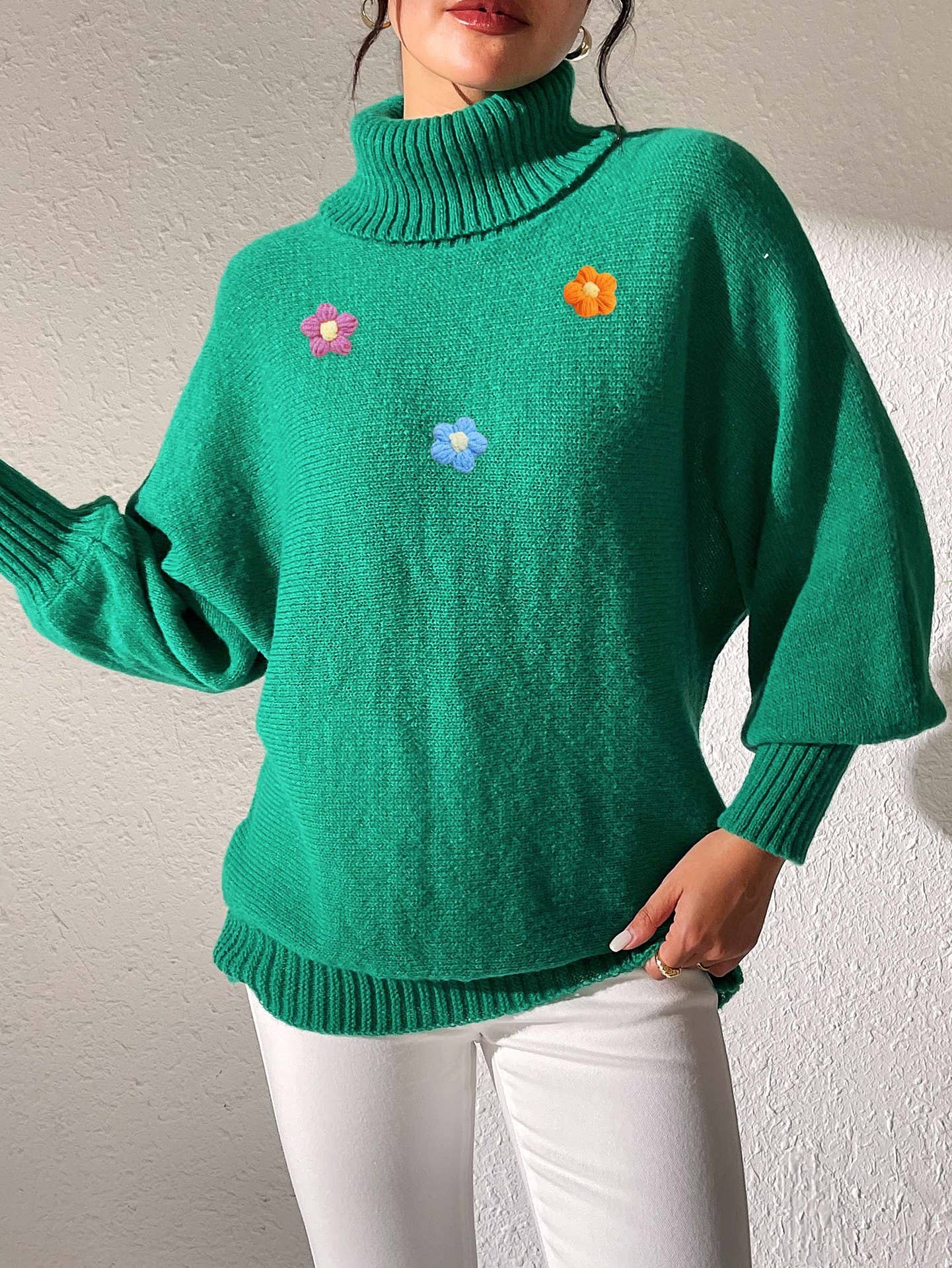 Simple hand-crocheted turtleneck sweater in a solid color