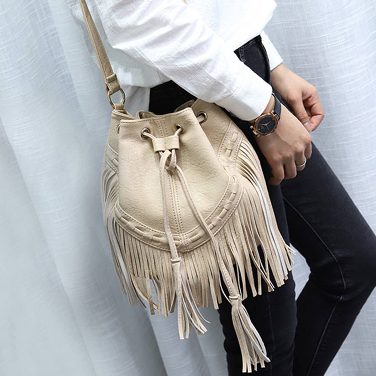 WOMEN LEATHER TASSEL BUCKET BAG_CWAB0791