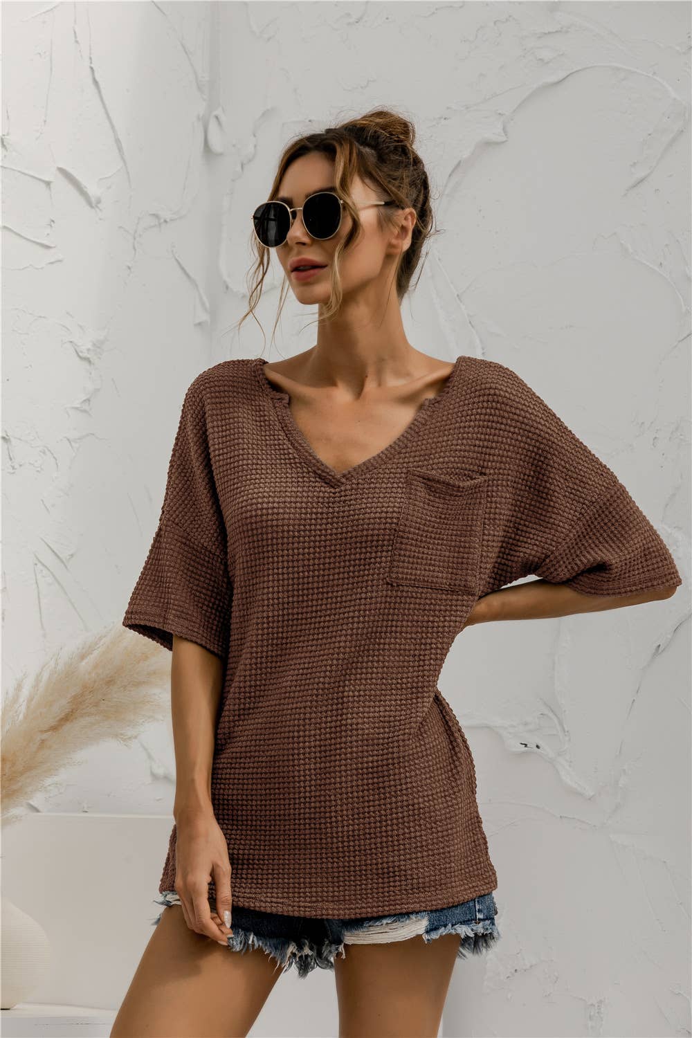 V-neck pocket slit solid-color knitted top