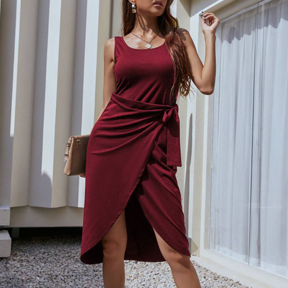 Dress with irregular pendant straps