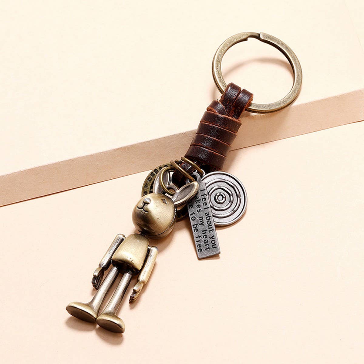MOVABLE CARTOON ROBOT LEATHER KEYCHAIN