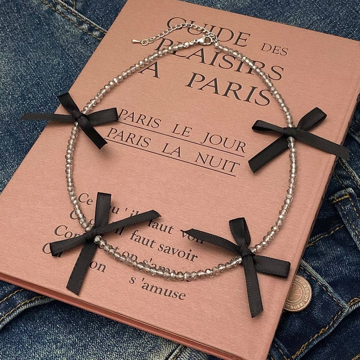 HAND-WOVEN BLACK CRYSTAL BEADED BOW NECKLACE