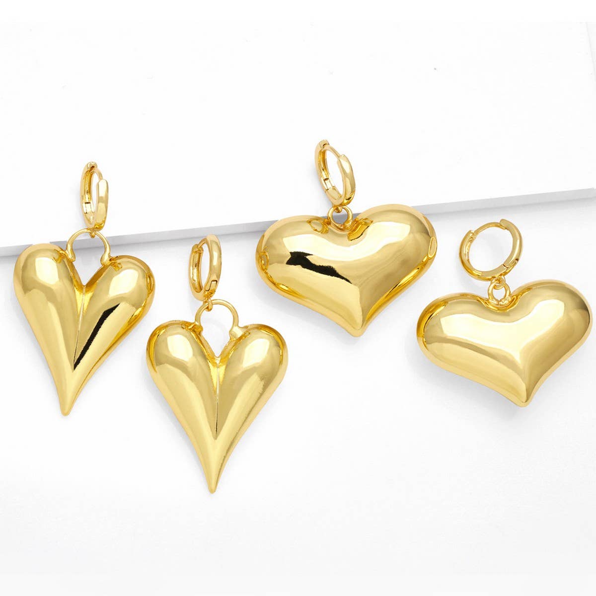 GOLD PLATED HEART-SHAPED PENDANT EARRINGS