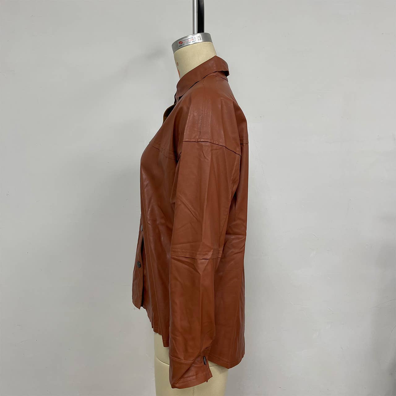 Lapel solid-color long-sleeved leather jacket