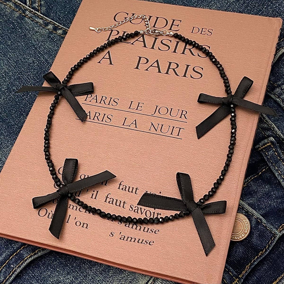 HAND-WOVEN BLACK CRYSTAL BEADED BOW NECKLACE