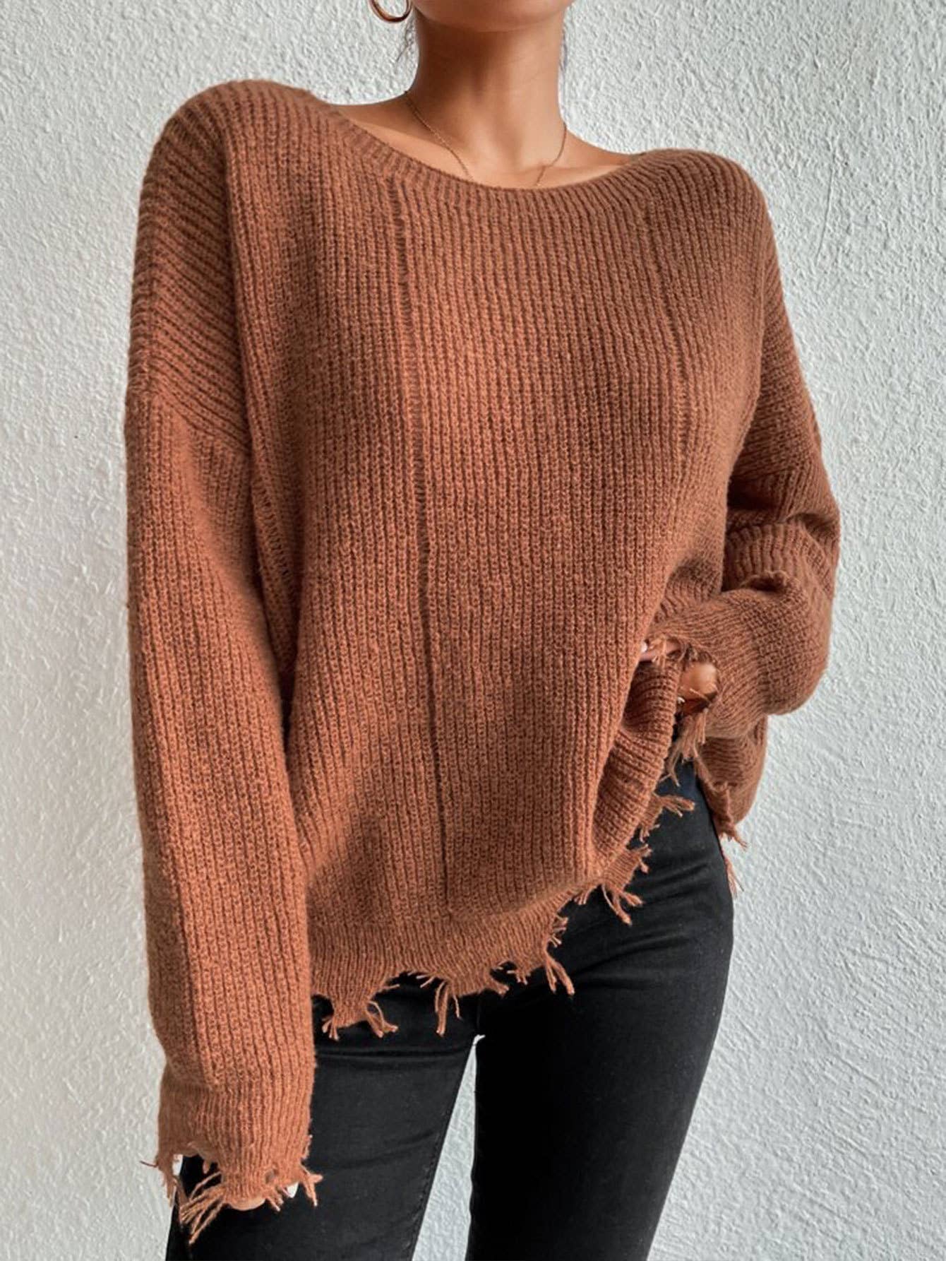 Laid-back style distressed frayed sweater