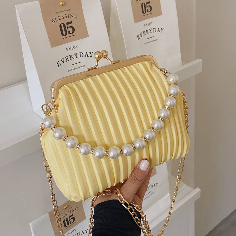 Pearl shell bag diagonally across the body