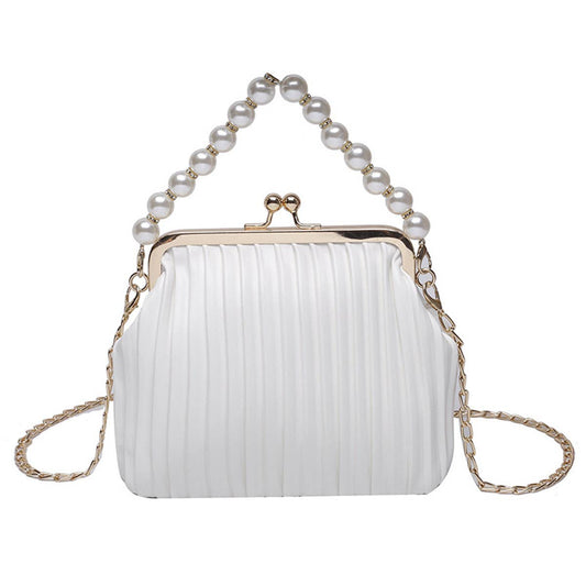 Pearl shell bag diagonally across the body