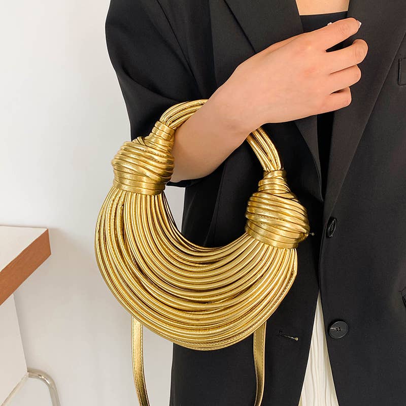 Metallic color striped appearance glossy handbag