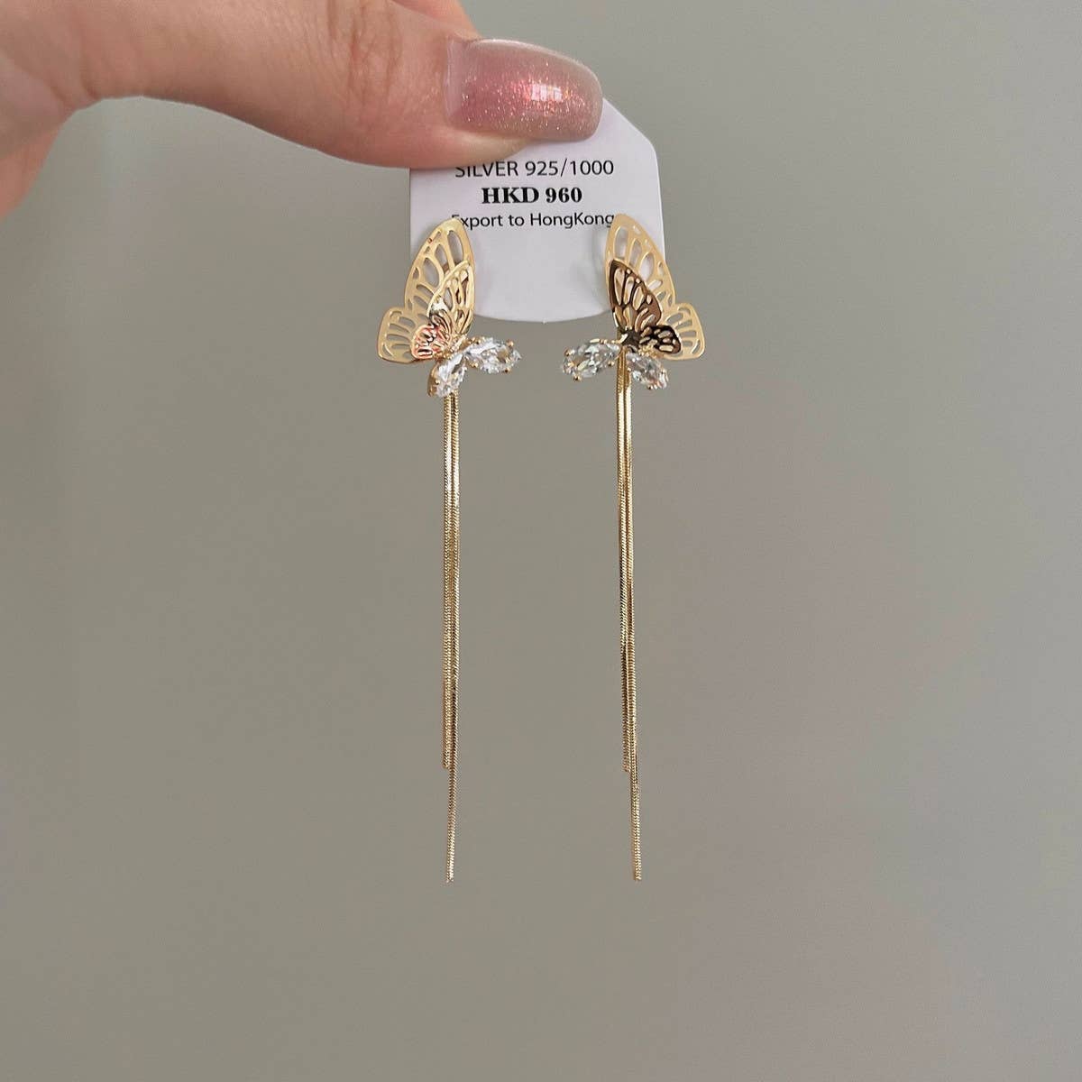 HOLLOW BUTTERFLY TASSEL EARRINGS